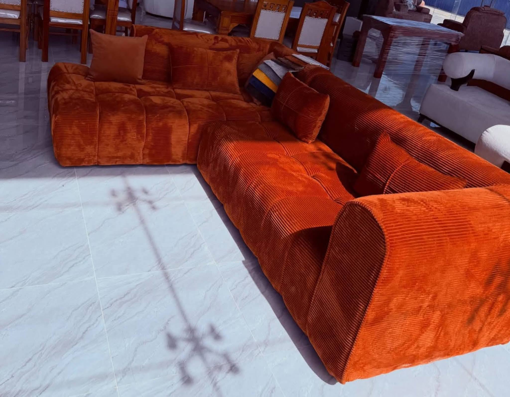 Rust corduroy sectional sofa